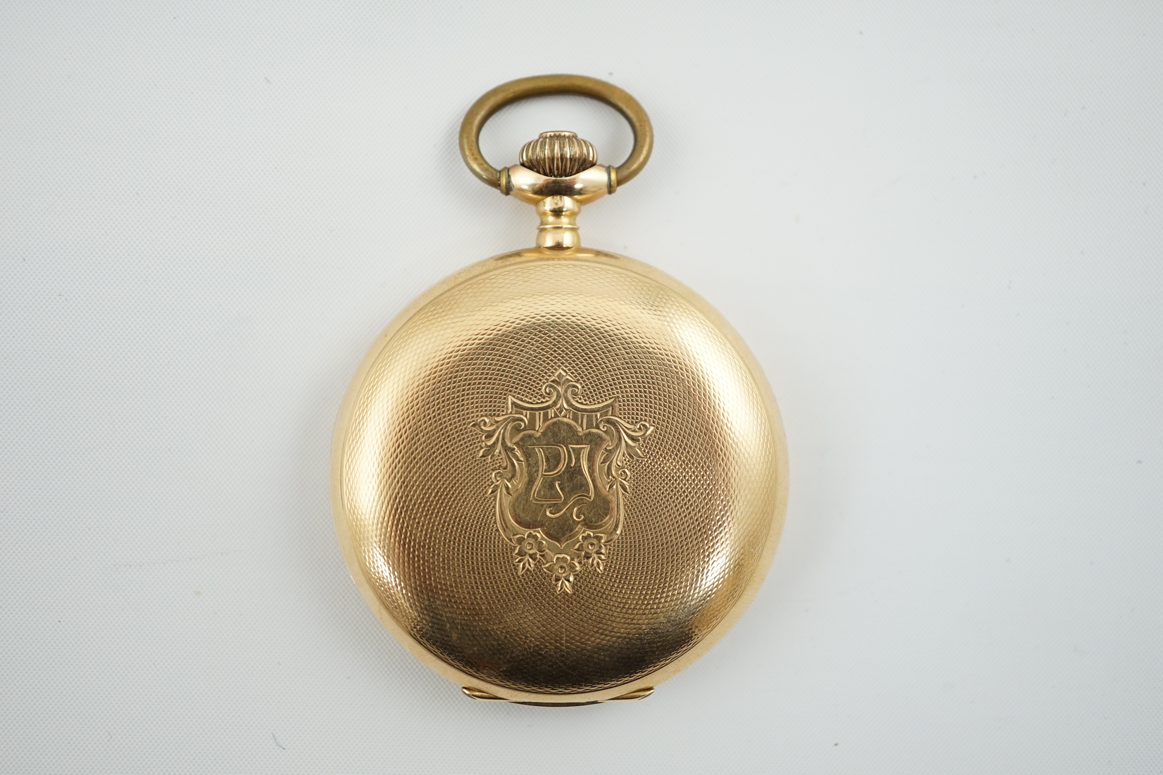 An early to mid 20th century Swiss engine turned 14k gold keyless lever hunter pocket watch